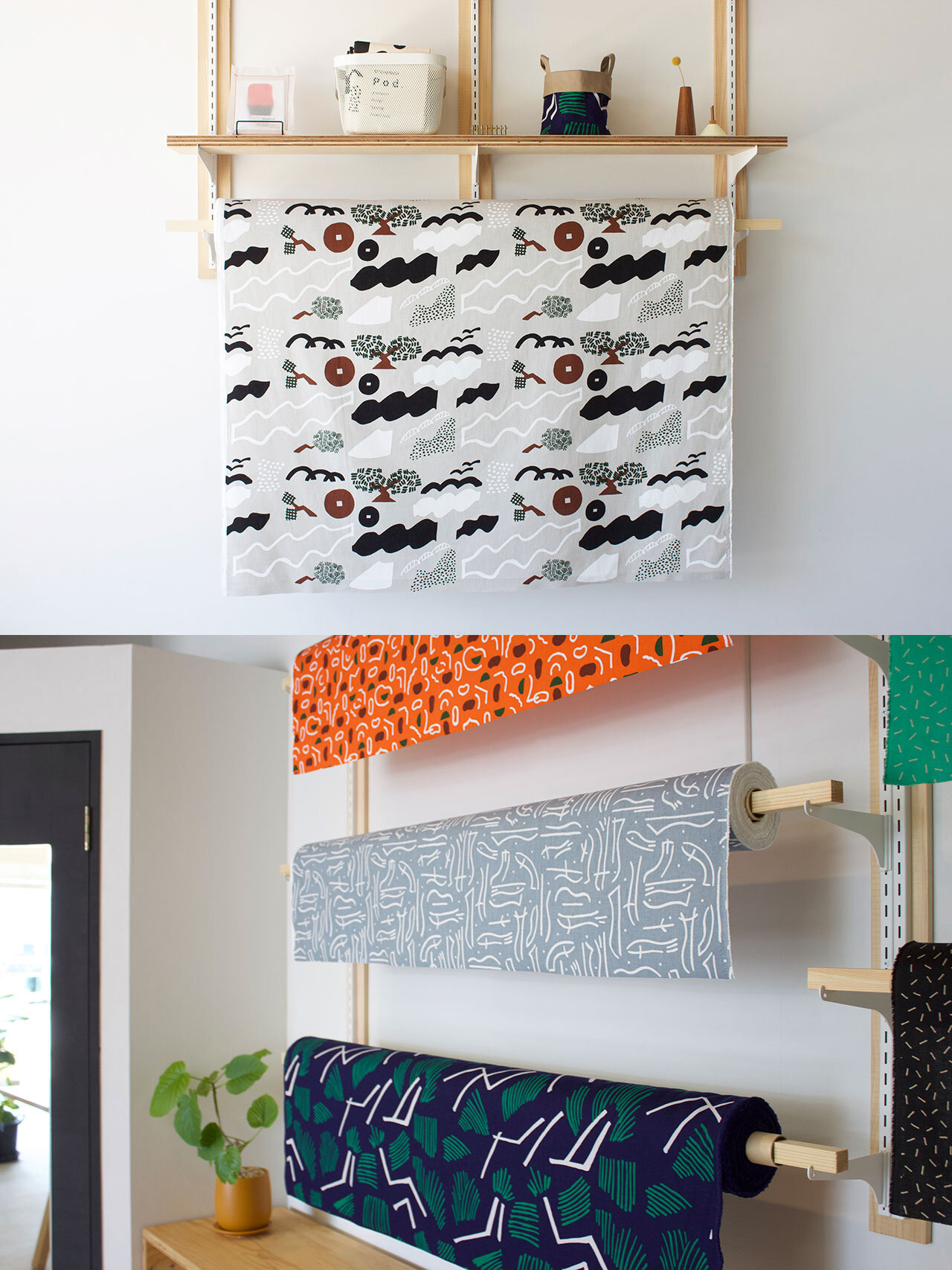 grasspool Pod.店舗で展示されるオリジナルテキスタイルSANUKI Textile。木製ラックに掛けられた複数デザインの生地